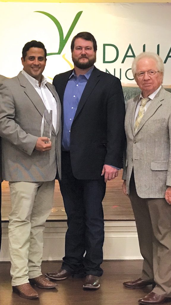 Omar Cruz (left) accepts the Vidalia Onion Committee Grower of the Year award from Troy Bland, Vidalia Onion Committee chairman, and Bob Stafford, Vidalia Onion Committee manager. Photo courtesy Vidalia Onion Committee