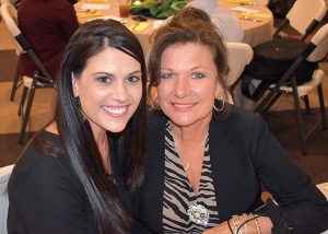 Megan Haygood and Dianne Stanley visit before dinner.