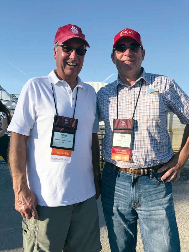 Greg Bennett and Doug Stanley pose together during the American Farms nursery tour.