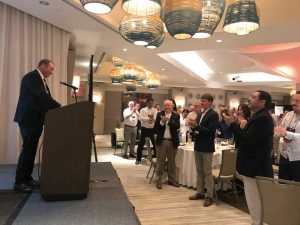 Doug Stanley, the outgoing NOA president, receives a standing ovation at the NOA convention banquet.